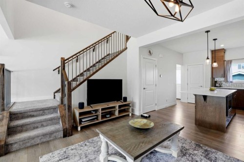 52 Emberside Grove, Cochrane, AB - Indoor Photo Showing Living Room