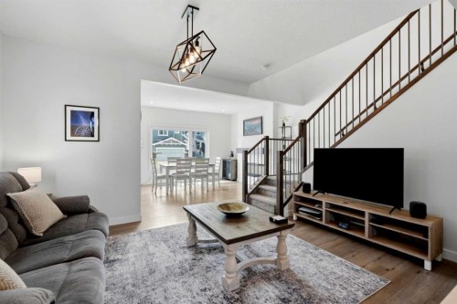 52 Emberside Grove, Cochrane, AB - Indoor Photo Showing Living Room