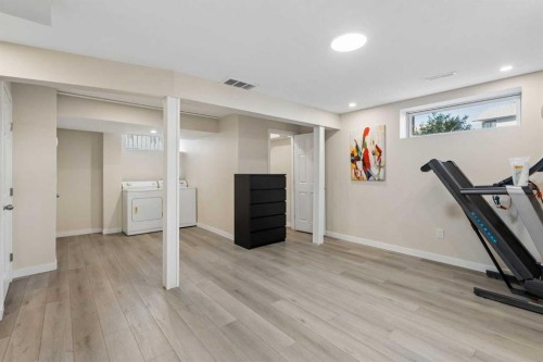 100 Applemont Close Se, Calgary, AB - Indoor Photo Showing Gym Room