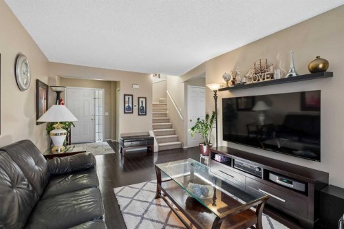 100 Applemont Close Se, Calgary, AB - Indoor Photo Showing Living Room