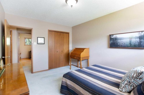 723 Seattle Drive Sw, Calgary, AB - Indoor Photo Showing Bedroom