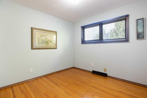 723 Seattle Drive Sw, Calgary, AB - Indoor Photo Showing Other Room