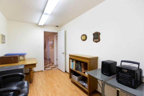723 Seattle Drive Sw, Calgary, AB - Indoor With Fireplace