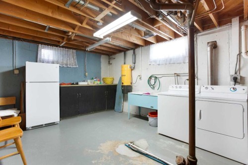 723 Seattle Drive Sw, Calgary, AB - Indoor Photo Showing Laundry Room