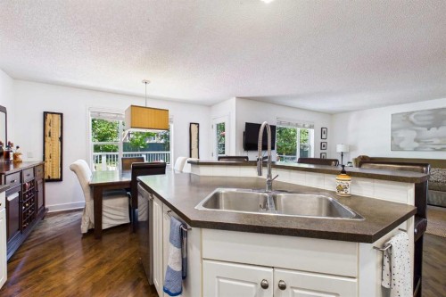 147 Tuscany Meadows Court Nw, Calgary, AB - Indoor Photo Showing Kitchen With Double Sink
