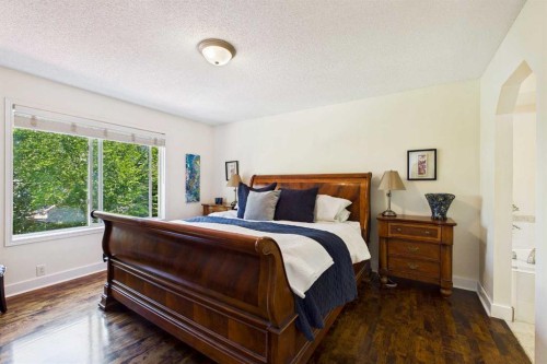 147 Tuscany Meadows Court Nw, Calgary, AB - Indoor Photo Showing Bedroom