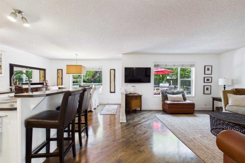 147 Tuscany Meadows Court Nw, Calgary, AB - Indoor Photo Showing Living Room