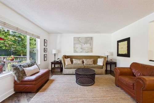 147 Tuscany Meadows Court Nw, Calgary, AB - Indoor Photo Showing Living Room
