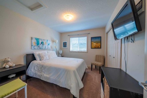 144 Everhollow Street Sw, Calgary, AB - Indoor Photo Showing Bedroom