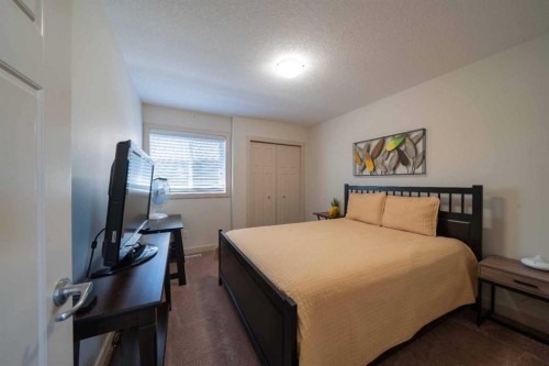 144 Everhollow Street Sw, Calgary, AB - Indoor Photo Showing Bedroom