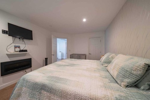 144 Everhollow Street Sw, Calgary, AB - Indoor Photo Showing Bedroom