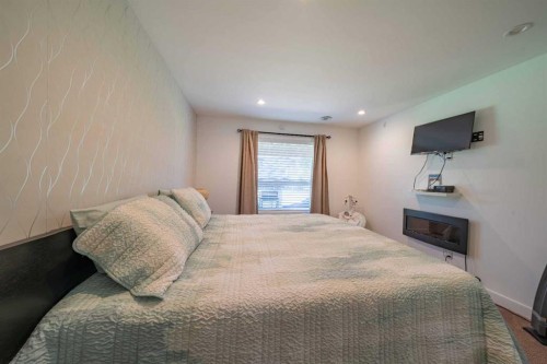 144 Everhollow Street Sw, Calgary, AB - Indoor Photo Showing Bedroom