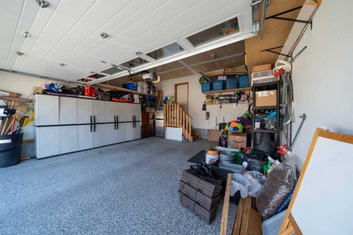 144 Everhollow Street Sw, Calgary, AB - Indoor Photo Showing Garage