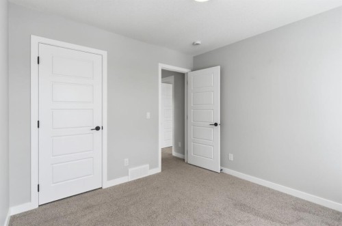 440 Lewiston Landing Ne, Calgary, AB - Indoor Photo Showing Other Room