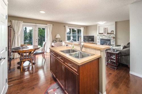 125 Silverado Range Cove Sw, Calgary, AB - Indoor With Fireplace