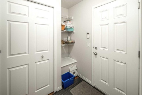 125 Silverado Range Cove Sw, Calgary, AB - Indoor Photo Showing Other Room