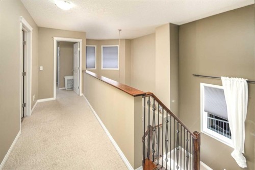 125 Silverado Range Cove Sw, Calgary, AB - Indoor Photo Showing Other Room