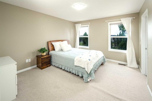 125 Silverado Range Cove Sw, Calgary, AB - Indoor Photo Showing Bedroom