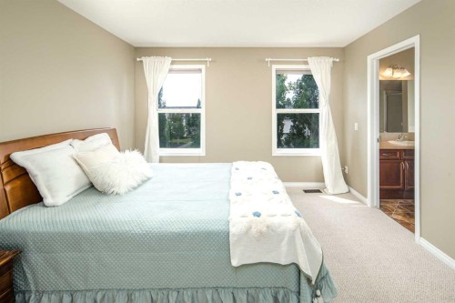 125 Silverado Range Cove Sw, Calgary, AB - Indoor Photo Showing Bedroom