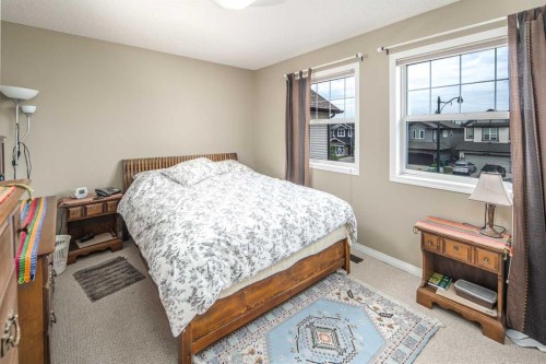 125 Silverado Range Cove Sw, Calgary, AB - Indoor Photo Showing Bedroom