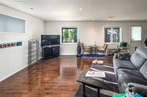 125 Silverado Range Cove Sw, Calgary, AB - Indoor Photo Showing Living Room