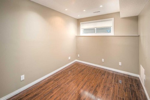 125 Silverado Range Cove Sw, Calgary, AB - Indoor Photo Showing Other Room