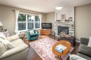 125 Silverado Range Cove Sw, Calgary, AB  - Indoor Photo Showing Living Room With Fireplace 