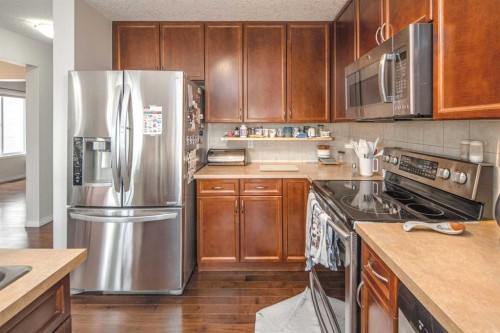 125 Silverado Range Cove Sw, Calgary, AB - Indoor Photo Showing Kitchen