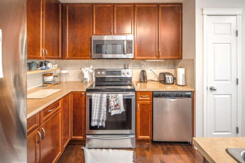 125 Silverado Range Cove Sw, Calgary, AB - Indoor Photo Showing Kitchen