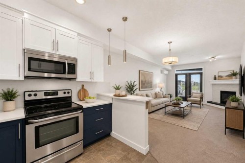 113-1005A Westmount Drive, Strathmore, AB - Indoor Photo Showing Kitchen With Upgraded Kitchen
