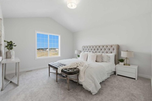 27 Verdure Gate Sw, Calgary, AB - Indoor Photo Showing Bedroom