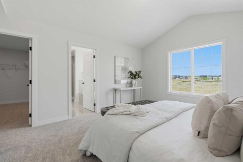 27 Verdure Gate Sw, Calgary, AB - Indoor Photo Showing Bedroom