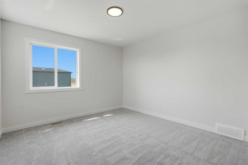 27 Verdure Gate Sw, Calgary, AB - Indoor Photo Showing Other Room