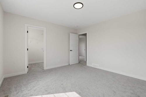 27 Verdure Gate Sw, Calgary, AB - Indoor Photo Showing Other Room