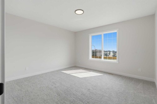 27 Verdure Gate Sw, Calgary, AB - Indoor Photo Showing Other Room