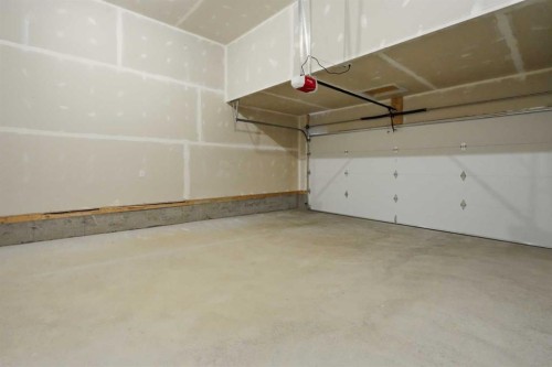 27 Verdure Gate Sw, Calgary, AB - Indoor Photo Showing Garage