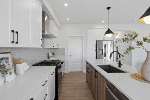 27 Verdure Gate Sw, Calgary, AB - Indoor Photo Showing Kitchen With Upgraded Kitchen