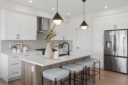 27 Verdure Gate Sw, Calgary, AB - Indoor Photo Showing Kitchen With Stainless Steel Kitchen With Upgraded Kitchen