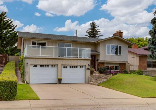 9527 Oakland Way Sw, Calgary, AB - Outdoor With Balcony
