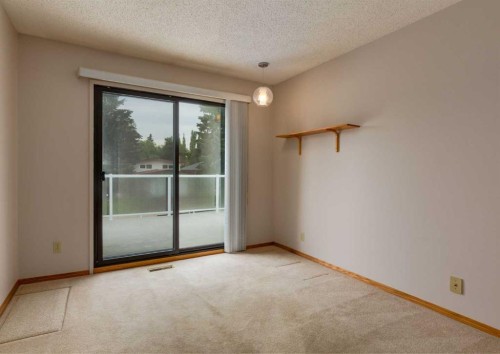 9527 Oakland Way Sw, Calgary, AB - Indoor Photo Showing Other Room