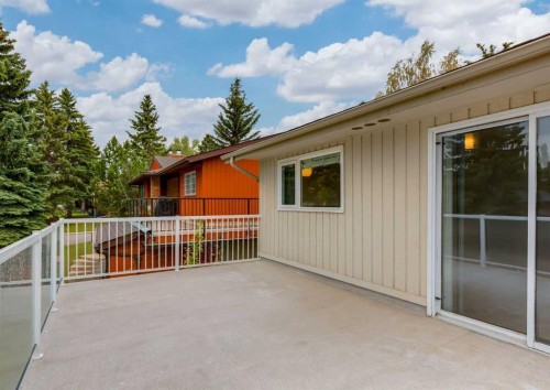 9527 Oakland Way Sw, Calgary, AB - Outdoor With Deck Patio Veranda With Exterior