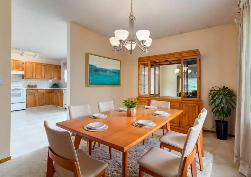 9527 Oakland Way Sw, Calgary, AB - Indoor Photo Showing Dining Room