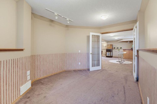 359 Hidden Ranch Place Nw, Calgary, AB - Indoor Photo Showing Other Room