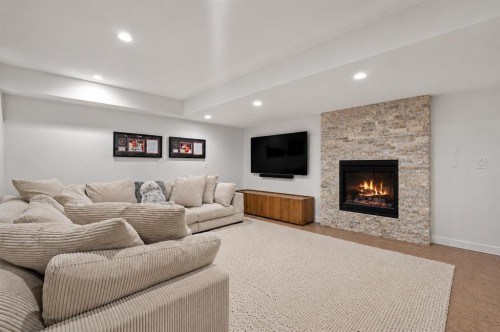 3041 1 Street Sw, Calgary, AB - Indoor Photo Showing Living Room With Fireplace