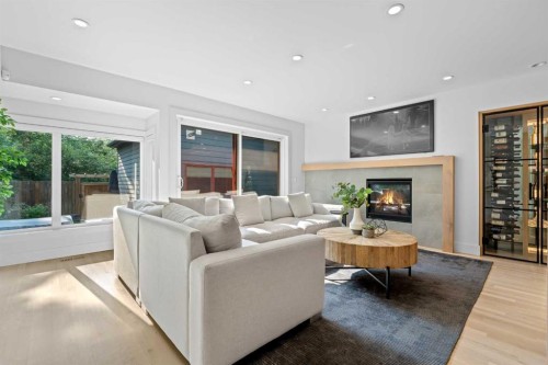3041 1 Street Sw, Calgary, AB - Indoor Photo Showing Living Room With Fireplace