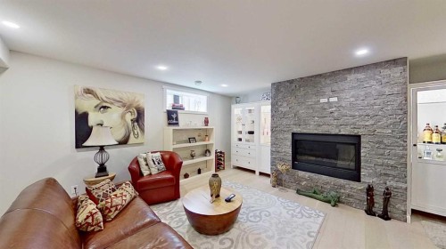 7 Bridlecrest Boulevard Sw, Calgary, AB - Indoor Photo Showing Living Room With Fireplace