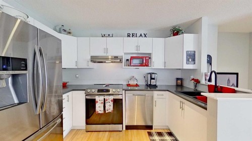 7 Bridlecrest Boulevard Sw, Calgary, AB - Indoor Photo Showing Kitchen With Stainless Steel Kitchen