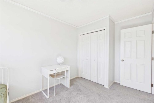 70 Coventry Crescent Ne, Calgary, AB - Indoor Photo Showing Bedroom