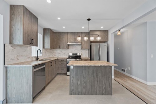 9408 5 Street Se, Calgary, AB - Indoor Photo Showing Kitchen With Upgraded Kitchen