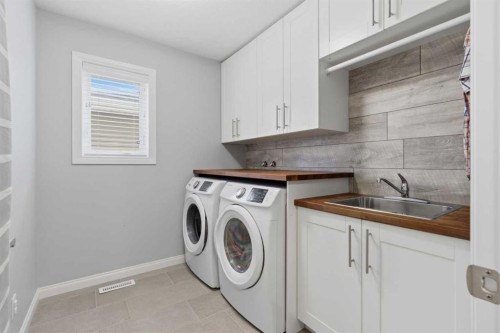 283 Nolanhurst Crescent Nw, Calgary, AB - Indoor Photo Showing Laundry Room